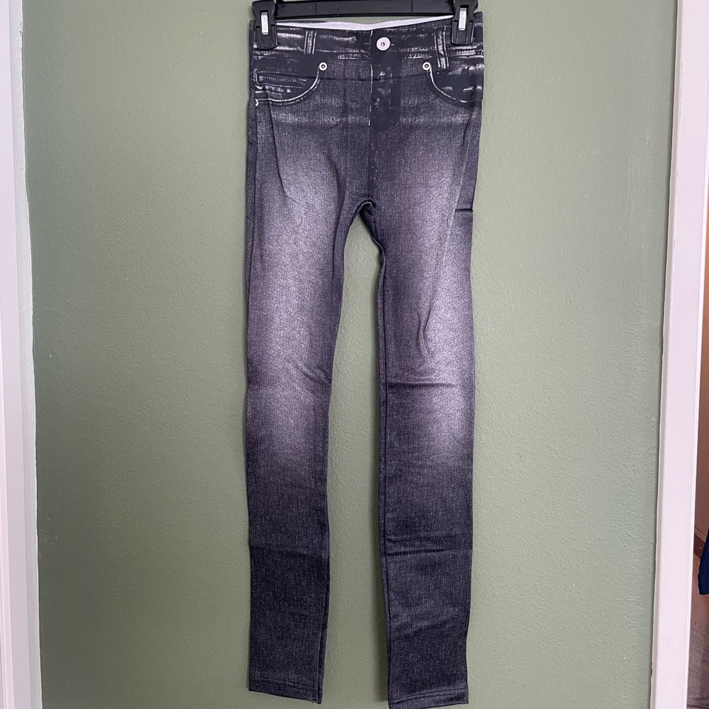Genie Slim Jeggings. 2 pants, blue and black. Fits S/M 4-8.